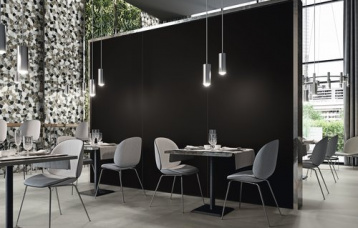 Monocolores Negro Natural 260x120 cm. Pavimento Dommel Grey 120x120 cm.